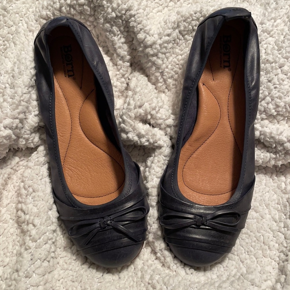 Brand New. Never worn.  Navy blue Born Dress flats. Size 9M